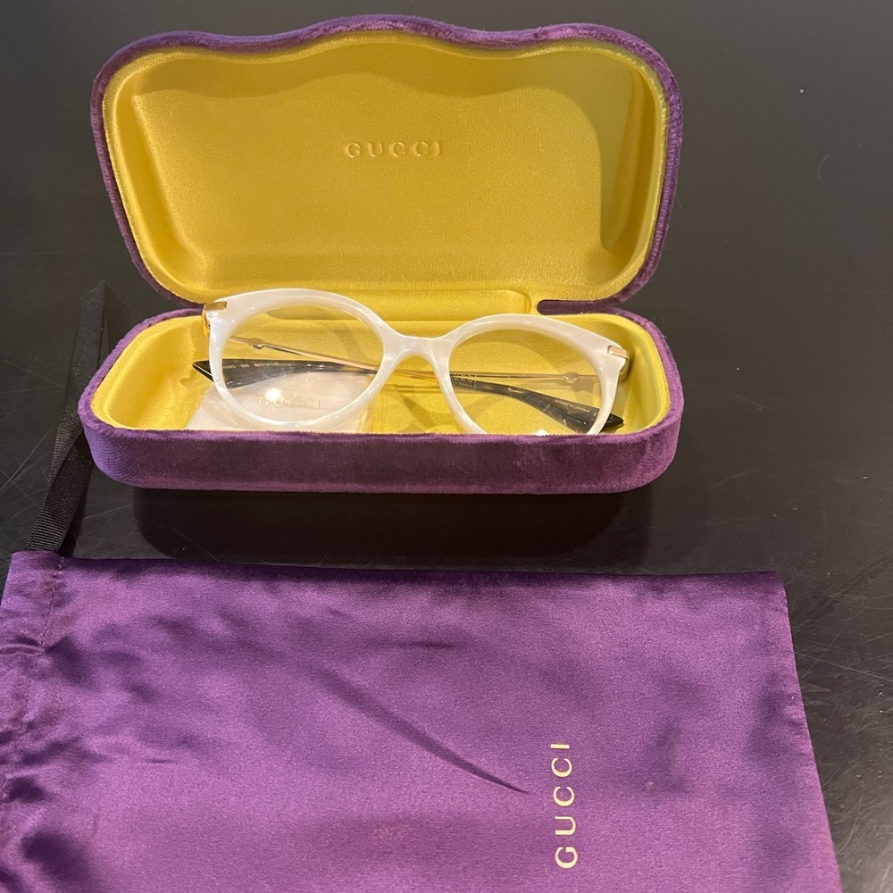 Gucci Translucent White Round Sunglasses with Gold Accents - Picture 2 of 3